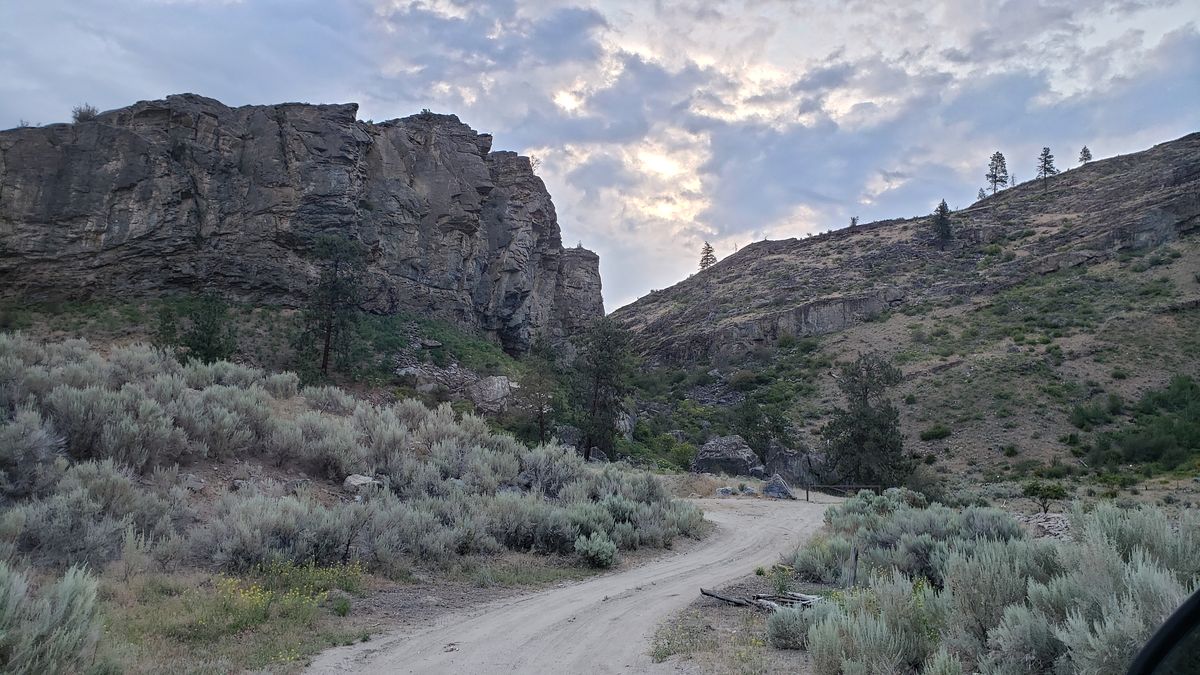 Gneiss cliff face in McLaughlin Canyon showing banded metamorphic rock layers