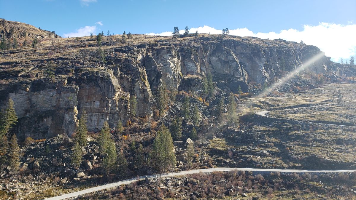 The approach to McLaughlin Canyon in fall, showing the open terrain before the corridor narrows
